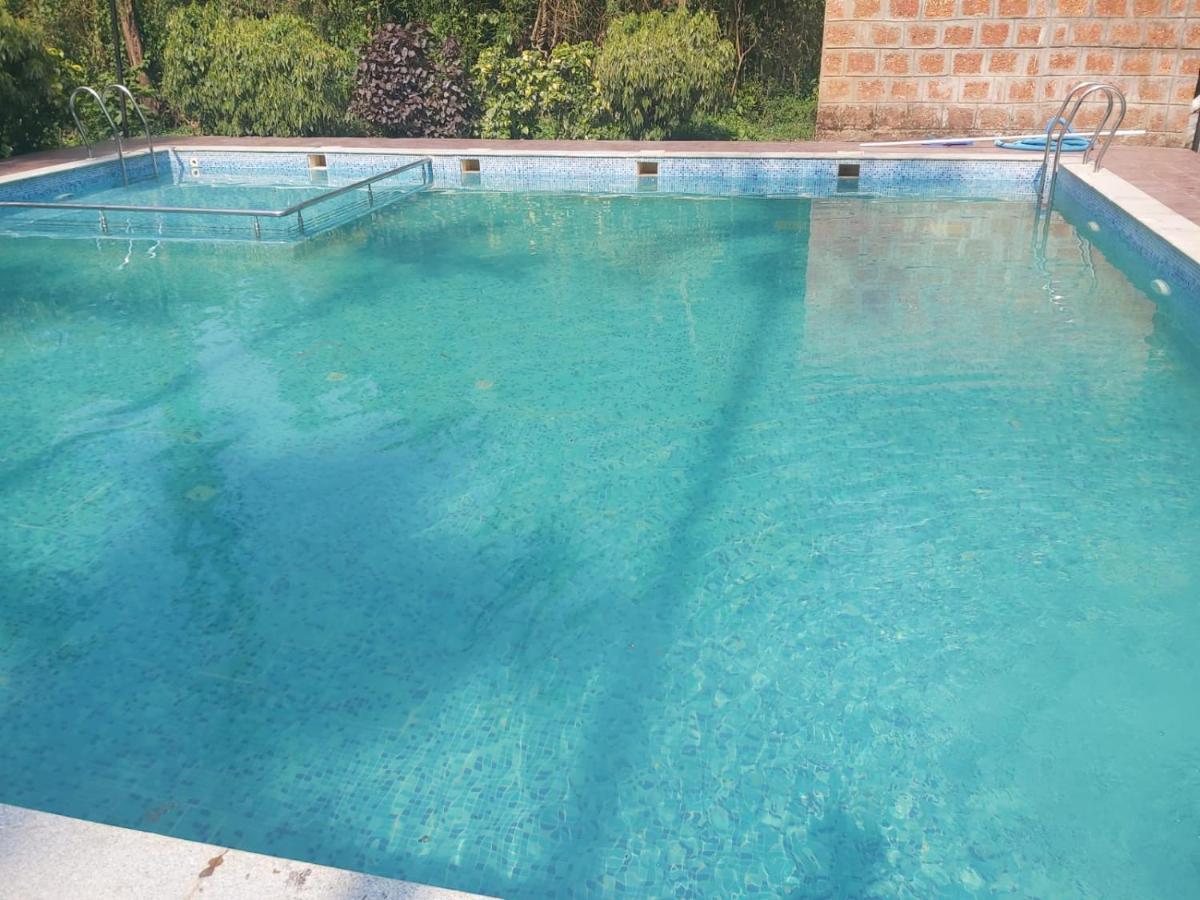Ezzenza Areca Resort Madikeri Luaran gambar
